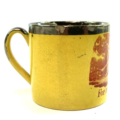 Lot 127 - An early Victorian canary yellow nursery mug.