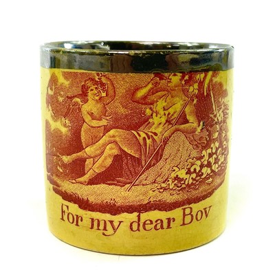 Lot 127 - An early Victorian canary yellow nursery mug.