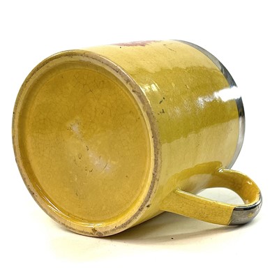 Lot 127 - An early Victorian canary yellow nursery mug.