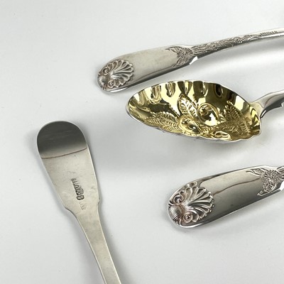 Lot 33 - A George III Scottish silver set of four berry spoons.