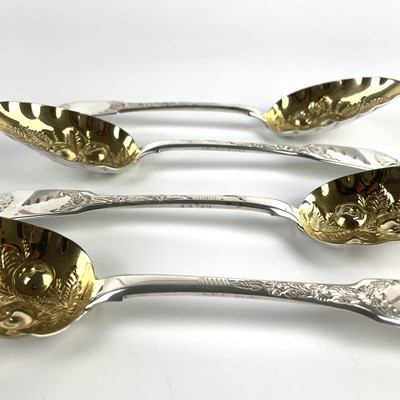 Lot 33 - A George III Scottish silver set of four berry spoons.
