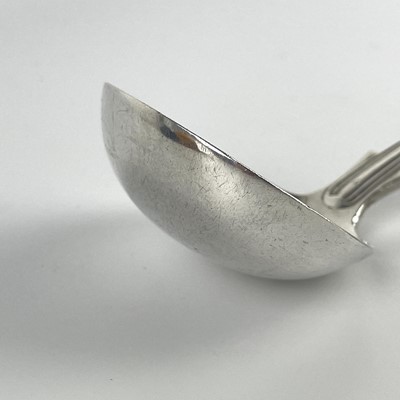 Lot 30 - A George V silver King's Pattern sauce ladle.