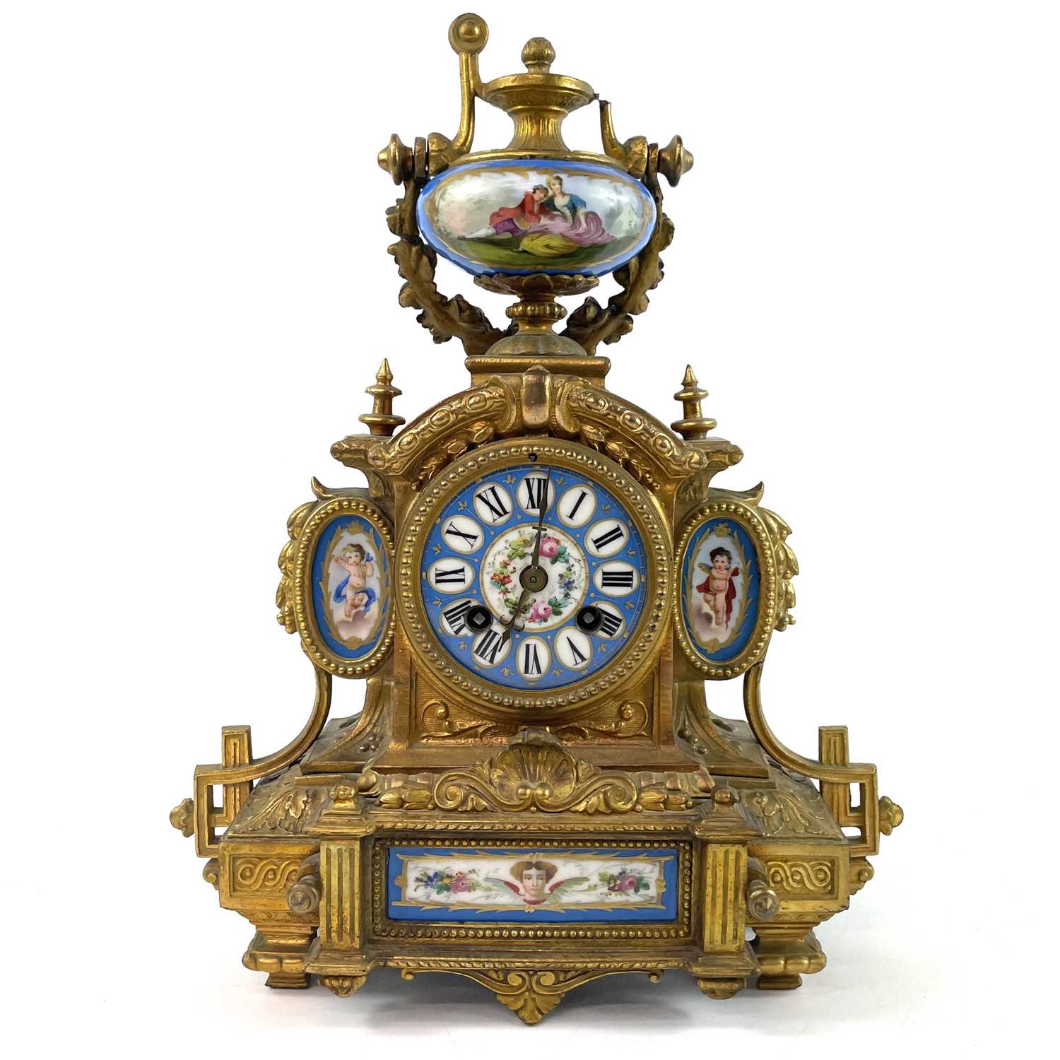 Lot 1705 - A French gilt spelter mantel clock.