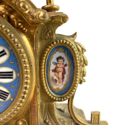 Lot 1705 - A French gilt spelter mantel clock.