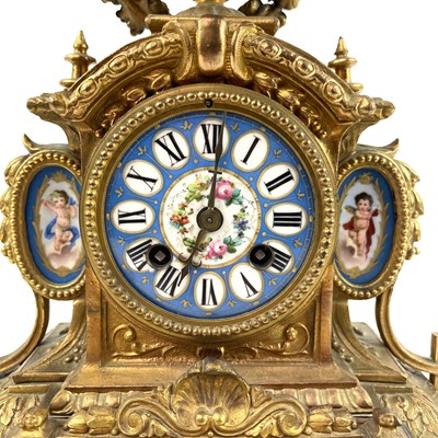 Lot 1705 - A French gilt spelter mantel clock.