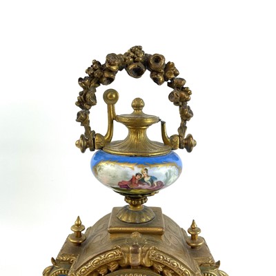 Lot 1705 - A French gilt spelter mantel clock.