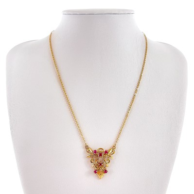 Lot 167 - A 1970's 9ct gold ruby set pendant necklace.