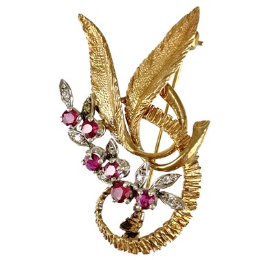 Lot 40 - A 1970's 9ct rose and white gold diamond and ruby set brooch.