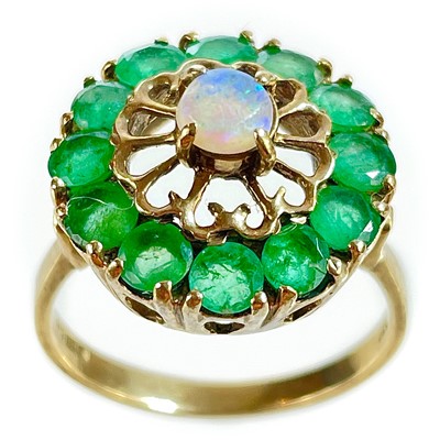 Lot 212 - A 9ct gold emerald and opal set ring.