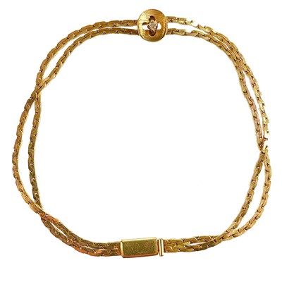 Lot 4 - A 9ct gold double strand fancy link bracelet.