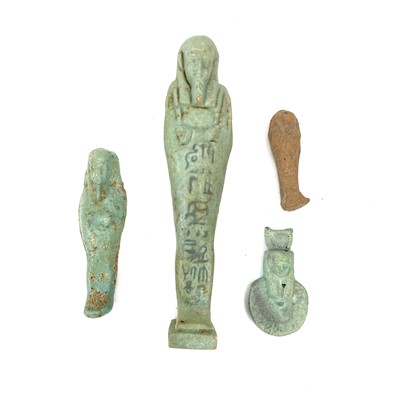 Lot 308 - An Egyptian faience shabti.