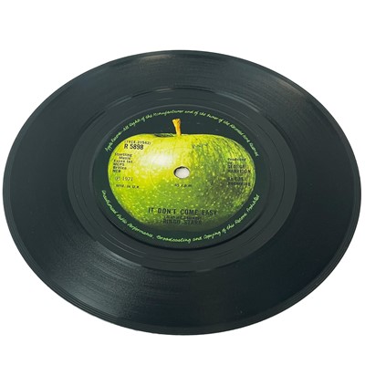 Lot 43 - The Beatles. The mother load of one hundred and forty-eight 7" singles, including solo work.