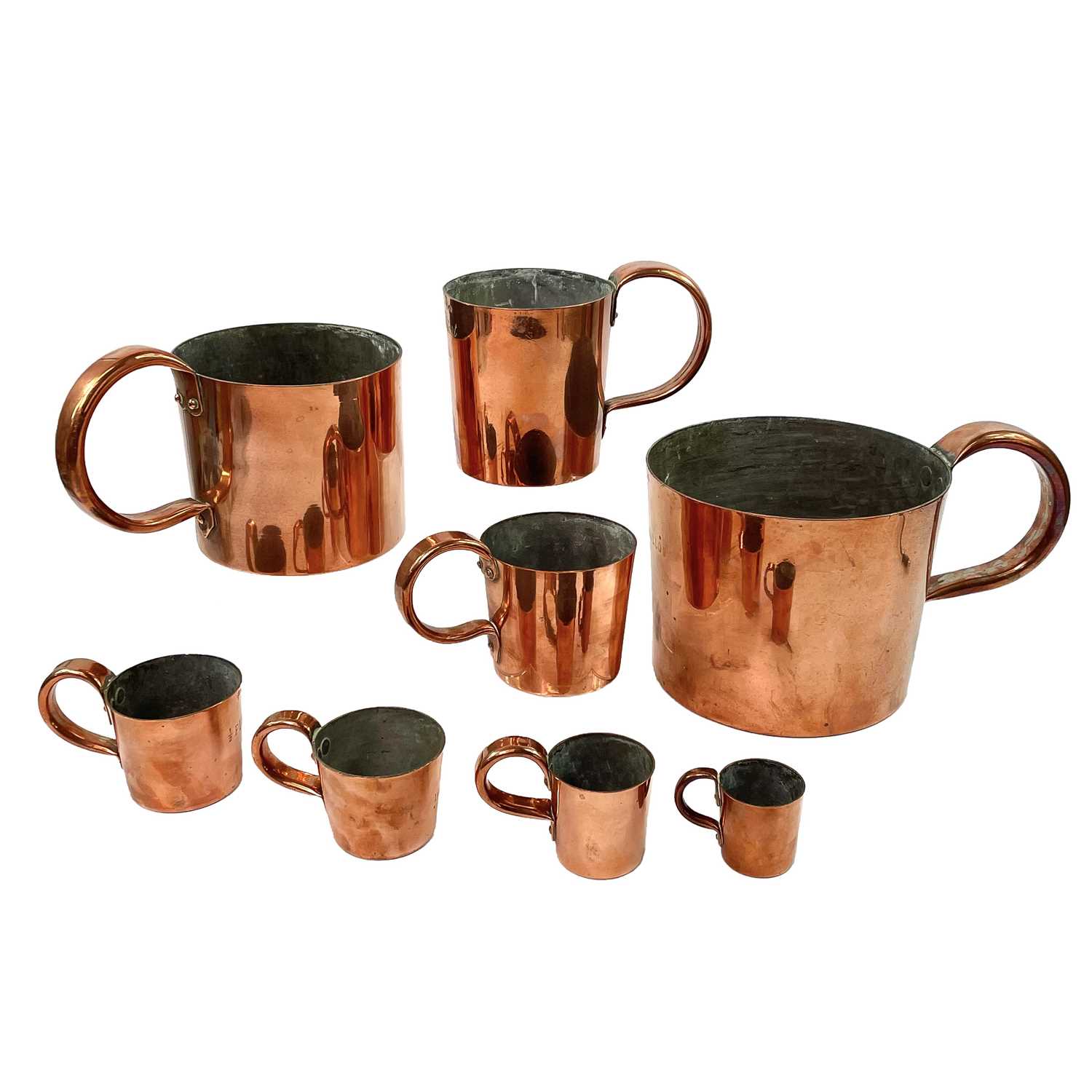 Lot 154 - A set of Royal Navy copper rum or grog measures.