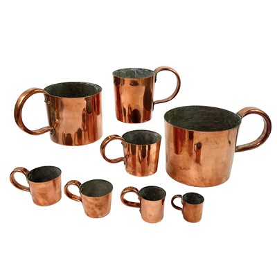 Lot 154 - A set of Royal Navy copper rum or grog measures.