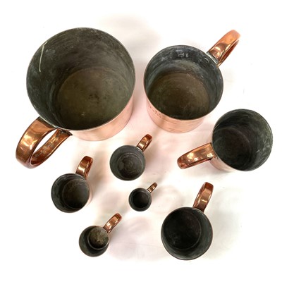 Lot 154 - A set of Royal Navy copper rum or grog measures.