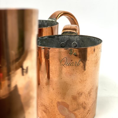 Lot 154 - A set of Royal Navy copper rum or grog measures.