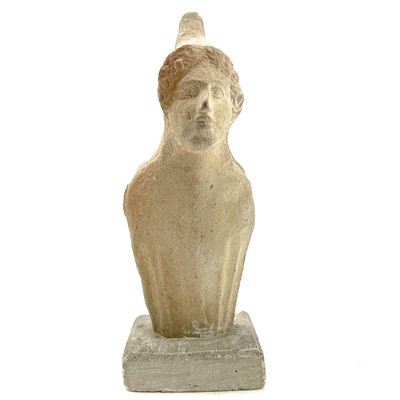 Lot 40 - A Cypriot limestone half length votive figure...