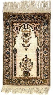 Lot 1285 - A Persian art silk prayer rug, mid 20th century.