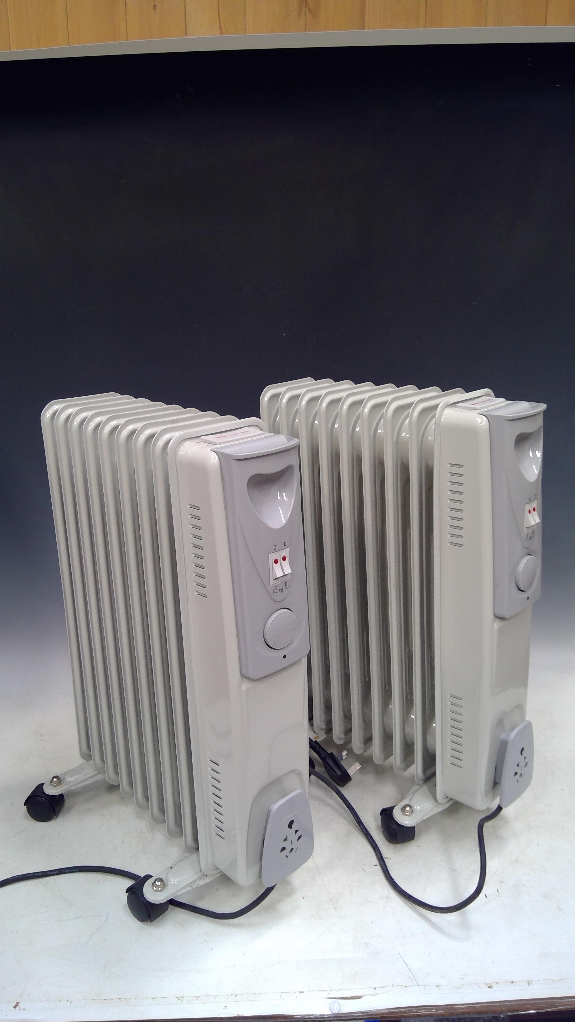 Lot 24 - Two DUNELM electric oil Filled Radiator's,