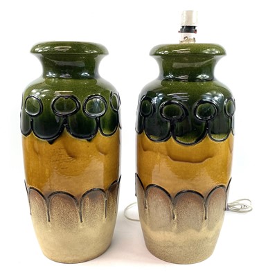 Lot 906 - A pair of large West German pottery lamps...