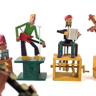 Lot 201 - A band of wooden automaton musicians.