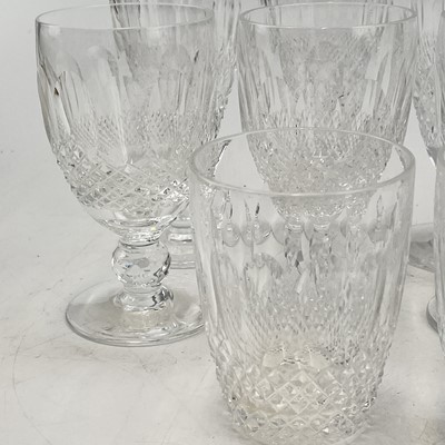 Lot 933 - A set of four Waterford crystal champagne...