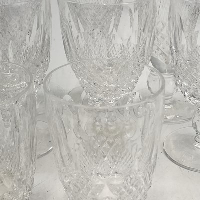 Lot 933 - A set of four Waterford crystal champagne...