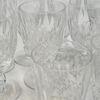 Lot 933 - A set of four Waterford crystal champagne...