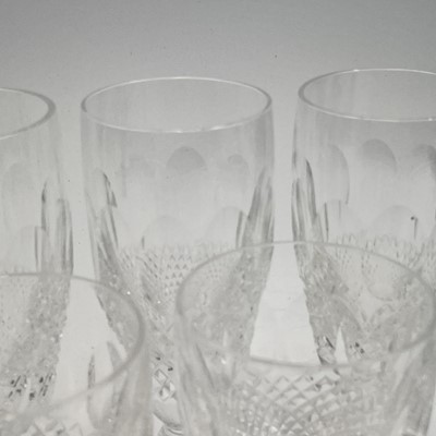 Lot 933 - A set of four Waterford crystal champagne...