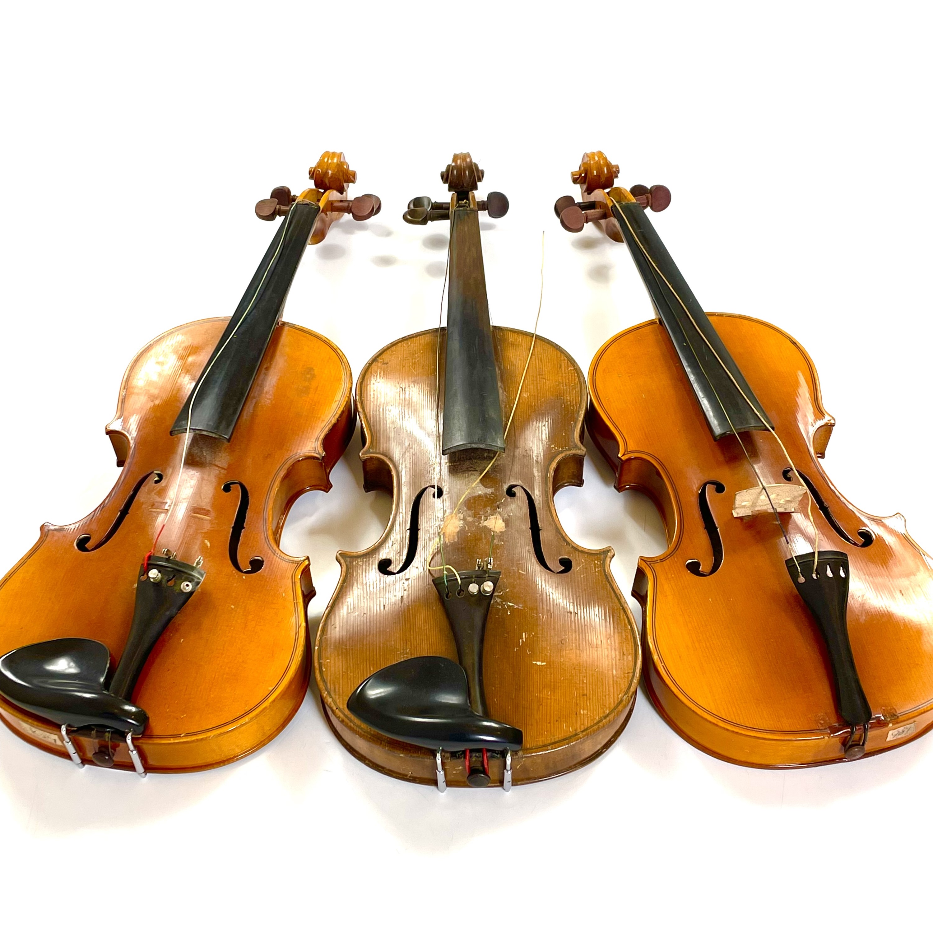 Lot 220 - Three cased violins