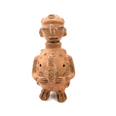 Lot 305 - Pre-Columbian style soapstone carving of a seated figure with chip carved decoration.