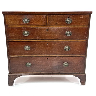 Lot 1885 - A late George III oak and mahogany chest of...