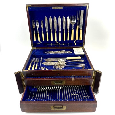 Lot 315 - A 20th century part canteen of cutlery in a two drawer mahogany case.