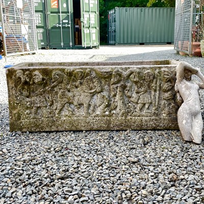 Lot 604 - A reconstituted stone rectangular planter with moulded classical figures.