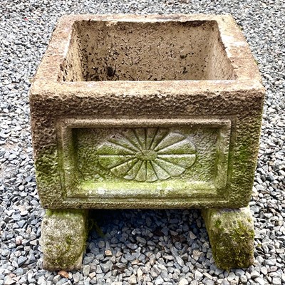 Lot 617 - A reconstituted stone rectangular planter with...