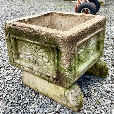 Lot 617 - A reconstituted stone rectangular planter with...