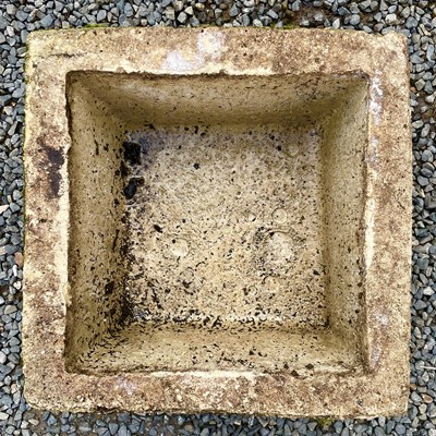 Lot 617 - A reconstituted stone rectangular planter with...