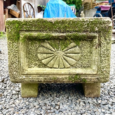 Lot 617 - A reconstituted stone rectangular planter with...
