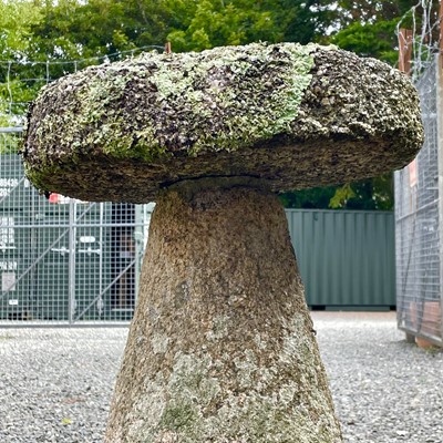 Lot 622 - Granite circular staddle stone with tapering...