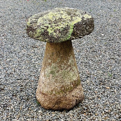 Lot 622 - Granite circular staddle stone with tapering...