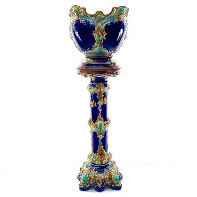 Lot 943 - A French Majolica jardiniere and stand, circa...