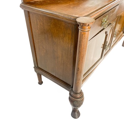 Lot 1878 - An Edwardian oak sideboard, fitted two drawers...