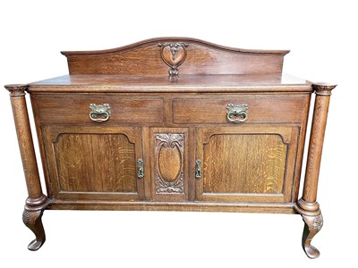 Lot 1893 - An Edwardian oak sideboard, fitted two drawers...