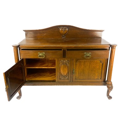 Lot 1878 - An Edwardian oak sideboard, fitted two drawers...
