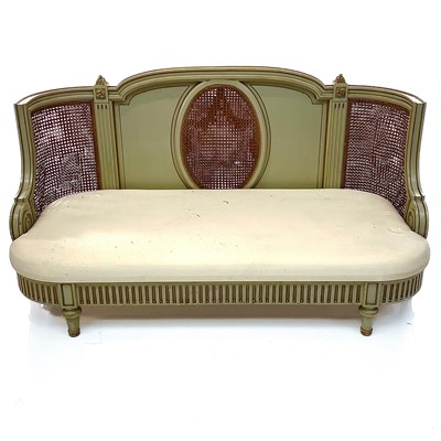 Lot 1894 - A French green painted and gilt Bergere settee,...