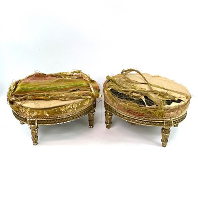 Lot 1899 - Two similar French giltwood oval footstools,...