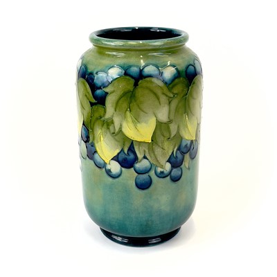 Lot 929 - A Moorcroft 'Leaf and Berry' pattern vase.