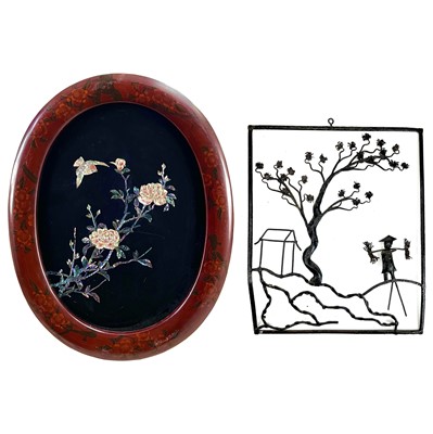 Lot 266 - A Japanese lacquer oval panel inlaid with mother of pearl.