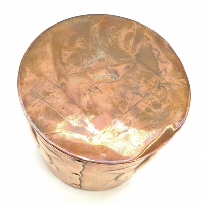 Lot 9 - A Newlyn copper cylindrical tea caddy and cover.
