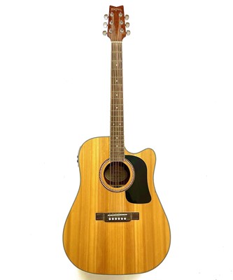 Lot 243 - A Wasburn D10SCE electro acoustic guitar.